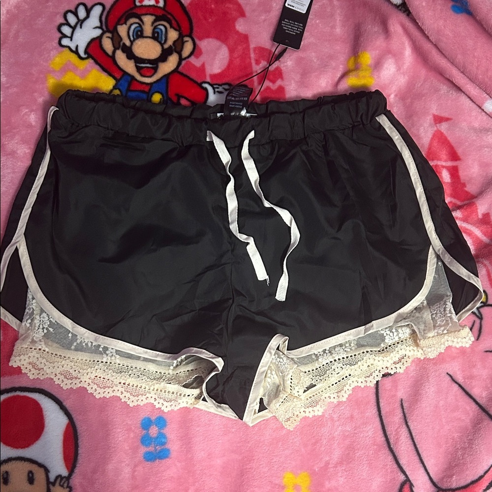 Fashion Nova Black and Cream Lace Trim Shorts